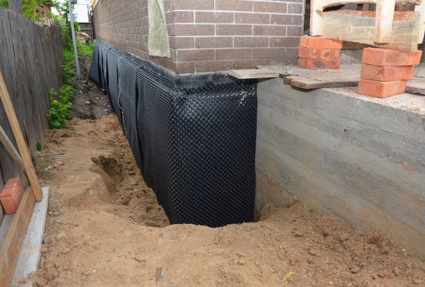 SJ Waterproofing Pros technician performing targeted Waterproofing assessment in Scotts, MI